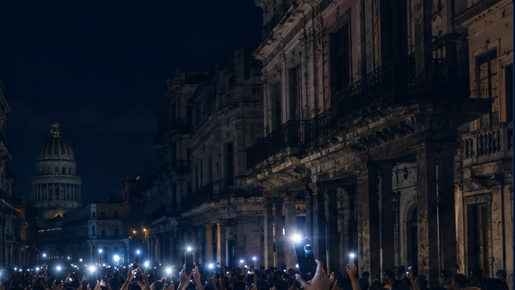 Ilustración editorial de una multitud en una calle habanera a oscuras durante una protesta por apagones